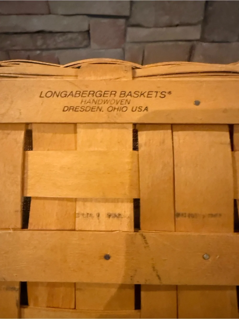 Longaberger newspaper basket. With lid , liner and wrought iron stand